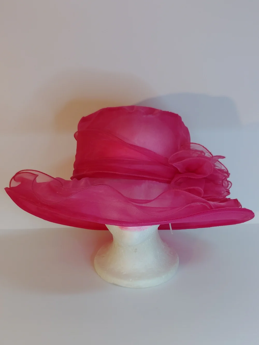 Elegant Hot Pink Organza Dress Hat with Floral Accent